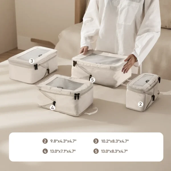 beige-compression-mesh-packing-cubes Beige travel packing cube set with clear tops in various sizes.