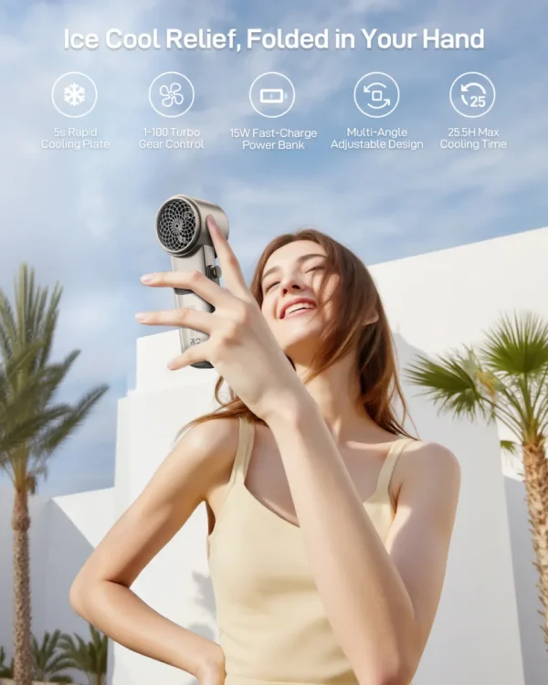 foldable-turbo-handheld-fan-for-ice-cool-relief Happy woman holding a silver portable ice-cool relief fan with a power bank feature.