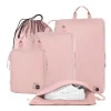 pink-nylon-compression-packing-cubes-travel-set Pink Epicka travel packing cubes, shoe bag, and drawstring pouch.